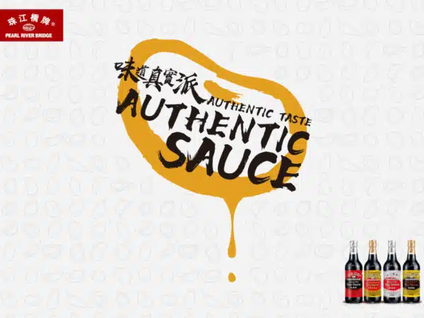 A flat lay of all ingredients needed for the sauce: a bottle of SauceGrandmaster gluten free soy sauce, a small bowl of brown sugar, a jar of honey, ginger and garlic (fresh or powdered), and a small bowl of cornstarch with a spoon. Clean, bright background.